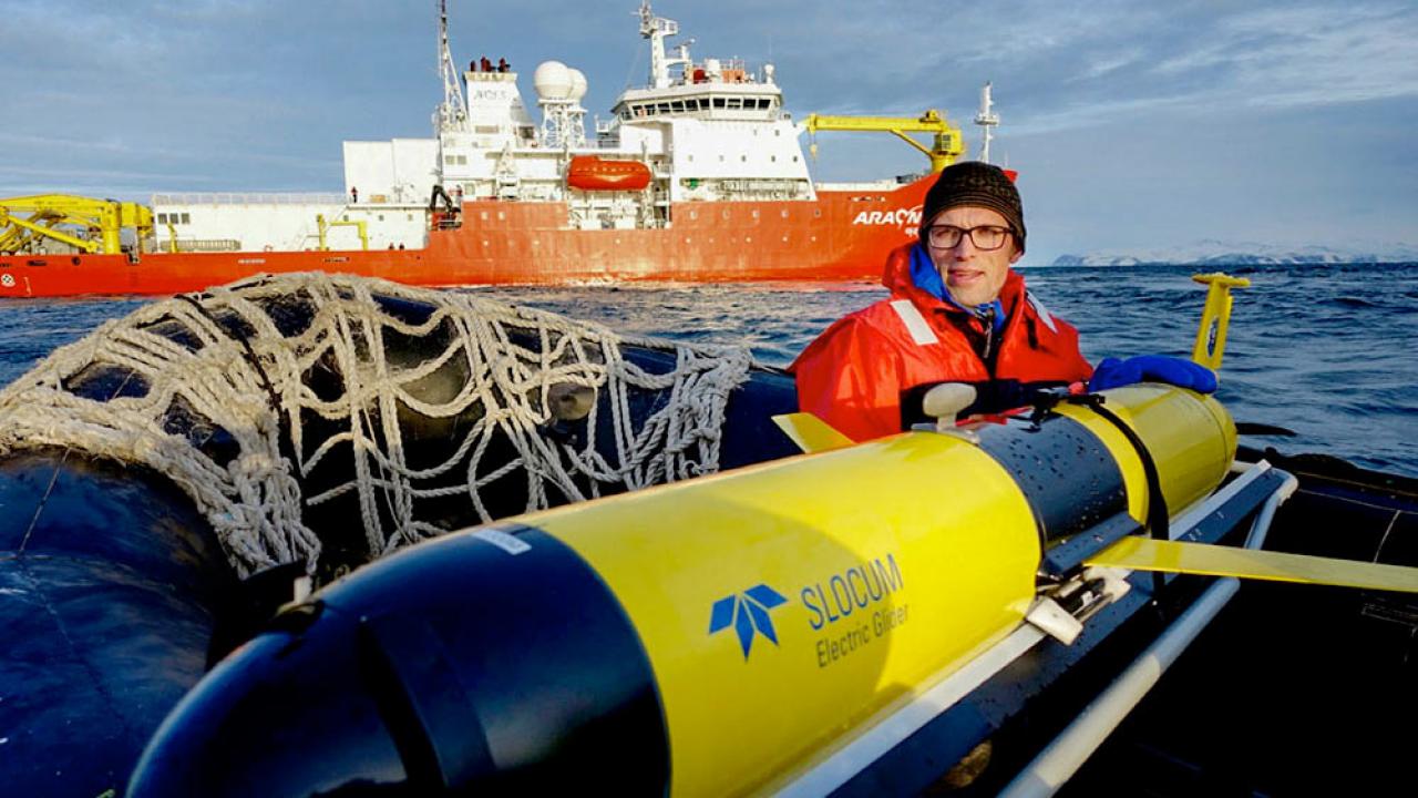 A TV researcher maintains a small submersible that is designed to collect ocean temperature data