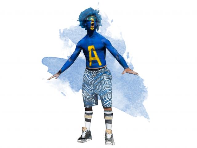 A TV fan sports blue body paint and a blue wig to support the Aggies